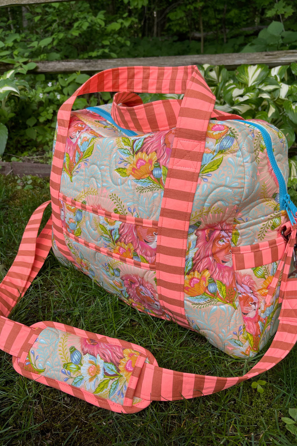 The By Annie Ultimate Travel Bag 2.0 using Tula Pink Everglow fabrics