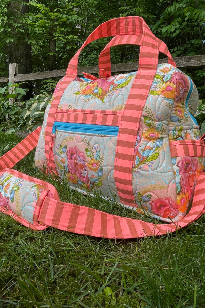 The By Annie Ultimate Travel Bag 2.0 using Tula Pink Everglow fabrics